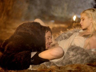 Jon Snow stands by the fire contemplating his next move for conquest when he is approached by Khalisse. A light touch from Khalisse is all it takes for John to capitulate. Leaning in, he captures her lips before guiding her to the ground by the fire so he can properly worship her with long kisses and tender caresses.As the flames warm them from behind, the couple creates their own heat. Jon kisses his way down Khalisse's supple body, working ever lower until he settles between her thighs. The heat of Khalisse's passion is undeniable as Jon explores every inch of her wet slit with his tongue. Greedy for more, Khalisse whimpers beneath Jon's ministrations until he gives in to her cries and fills her with his hard cock.Khalisse is putty in Jon's hands as she gets on her hands and knees to let him fuck her like the wonton she is. She turns around to suck her own musk from Jon's fuck stick, then rolls onto her back once again so Jon can satisfy her needs as she holds one thigh high to change the angle of penetration. Jon takes the gift Khalisse offers, dominating her until he pulls out to cover her in the mark of his love.